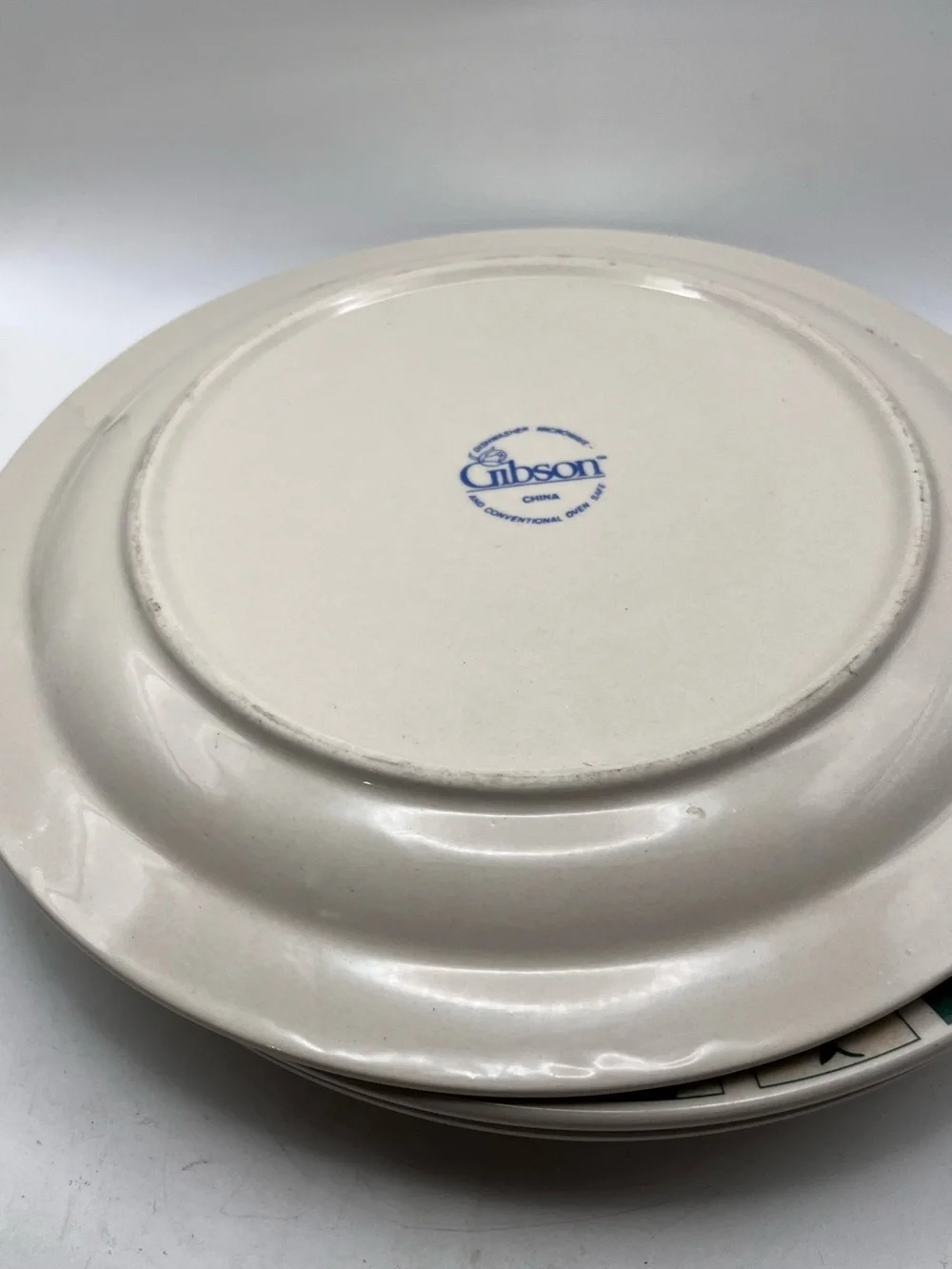 Gibson Cream Dinner Plate with Green Check Rim and Fruit Basket